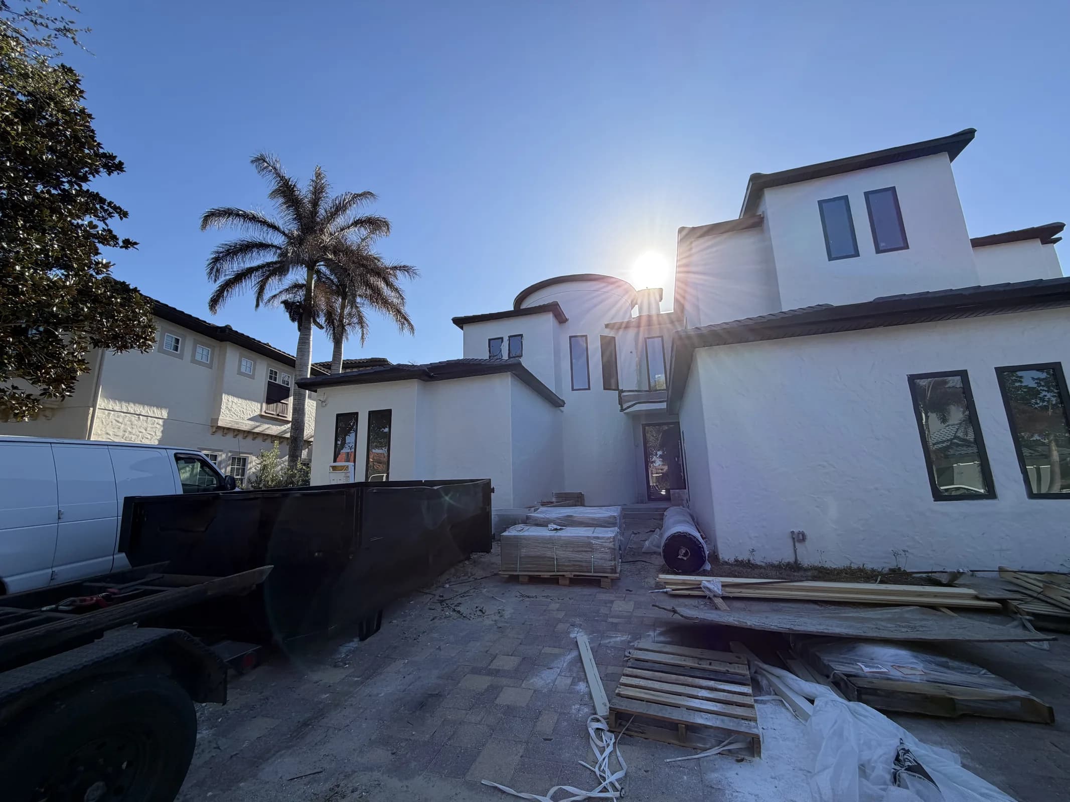 Dumpster placement on a residential driveway for a cleanup project